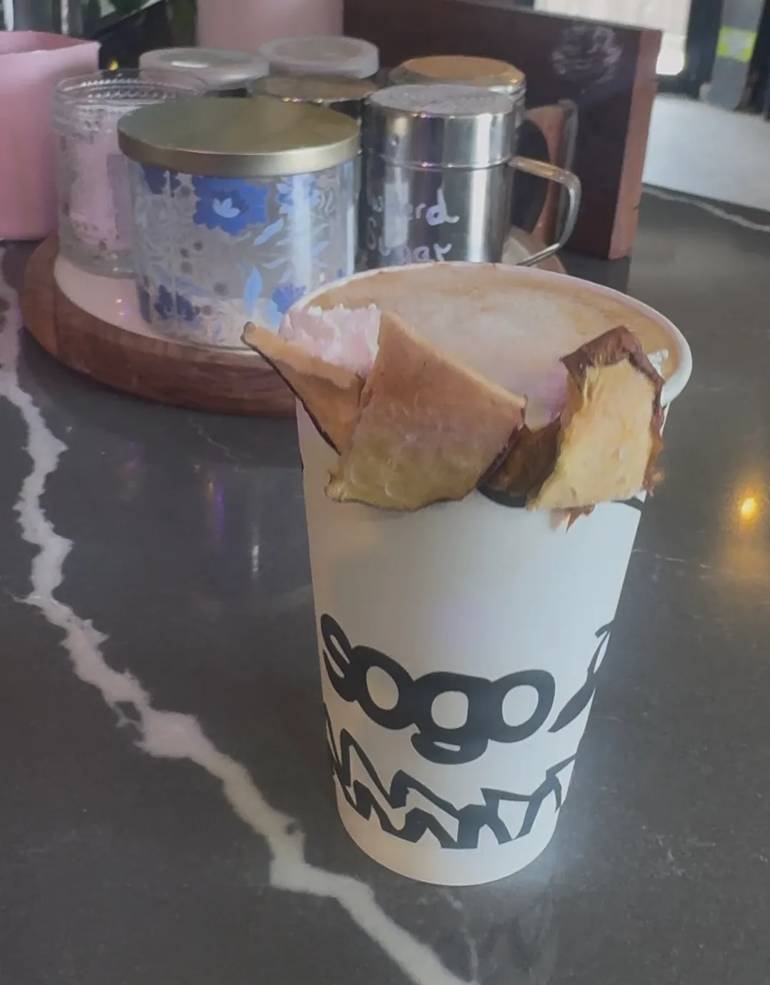 Apple Spice Latte. Espresso or ceremonial matcha with housemade apple spice syrup, choice of milk, a real candied apple chip rim, and whip.