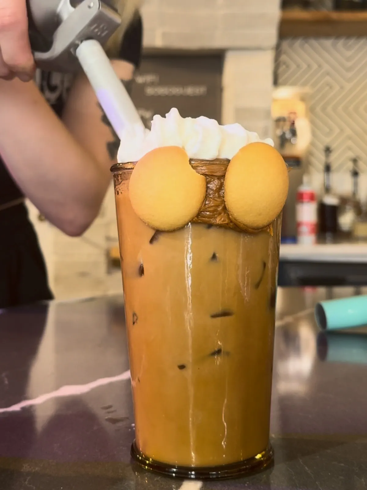 Banana Pudding Latte. Vanilla cookie caramel rim, housemade banana pudding syrup, housemade banana pudding whip.