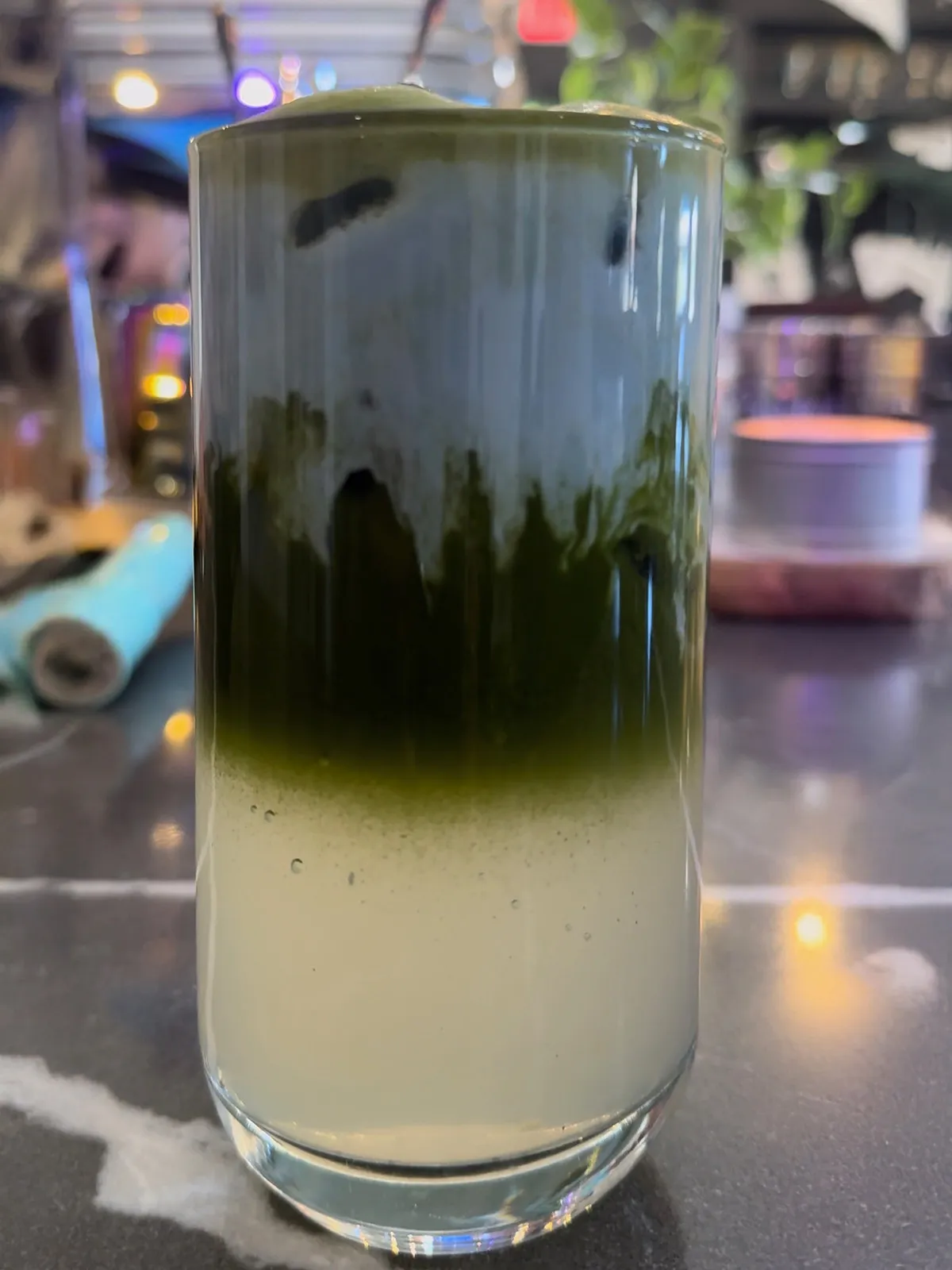 Cocowave Matcha. Matcha topped with a blue matcha cloud on a wave of coconut water with a splash of organic lemonade.