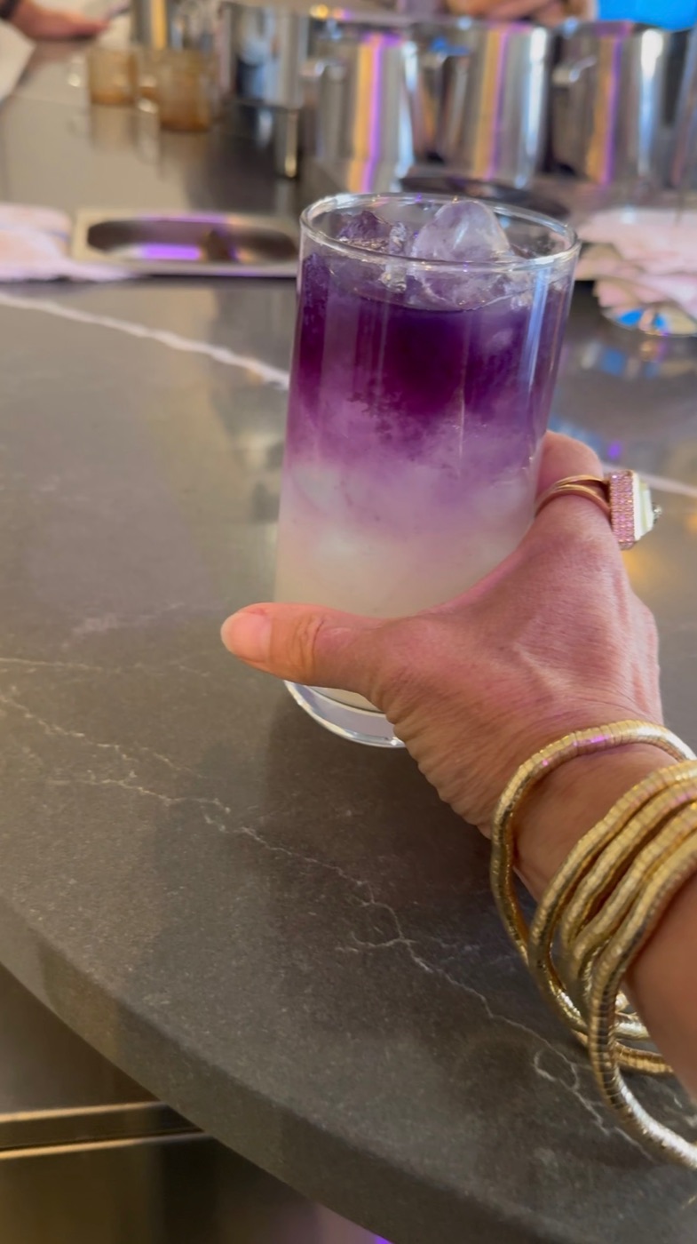 Layered blue and purple matcha lemonade over crystal-clear ice